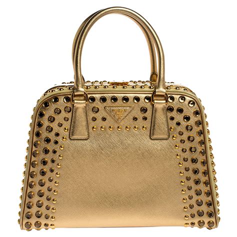 prada gold studded bag|Prada cross over bag.